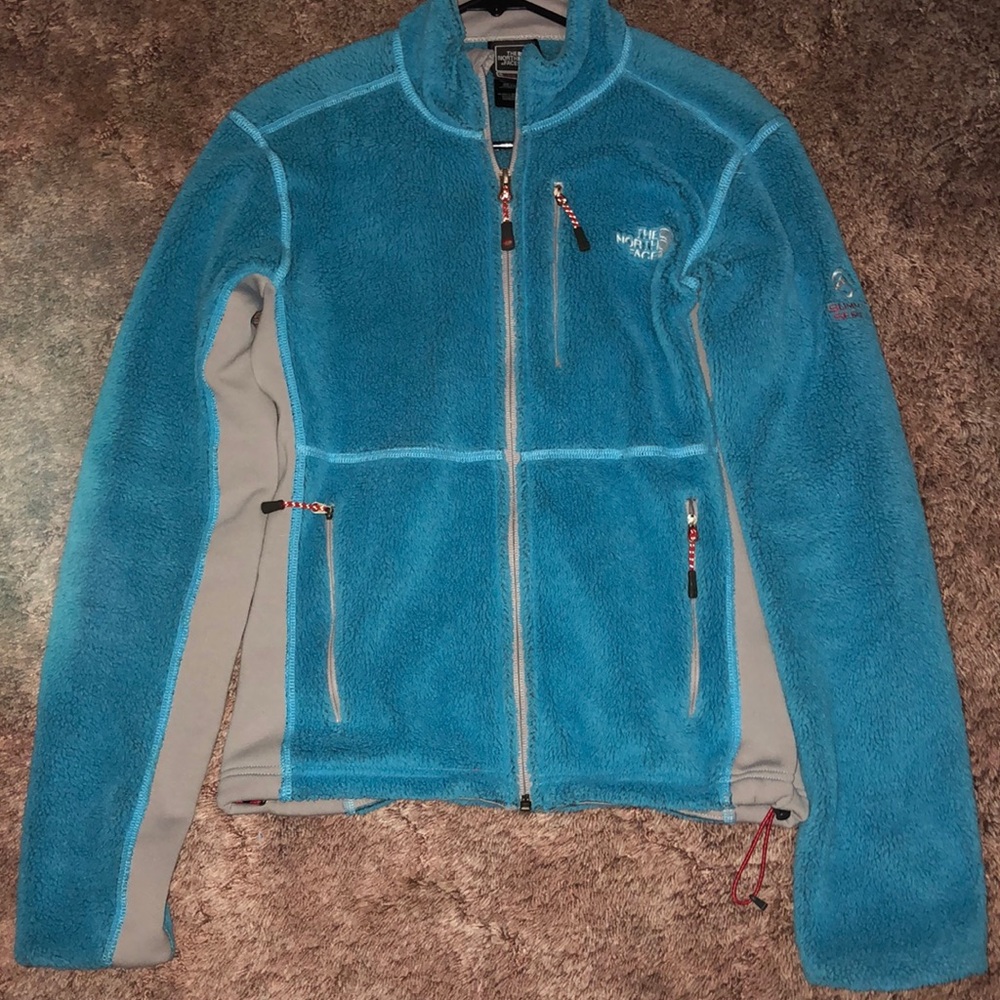 blue North Face zip up